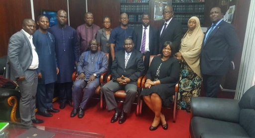 Group photograph of FIA officials at a GIABA plenary session